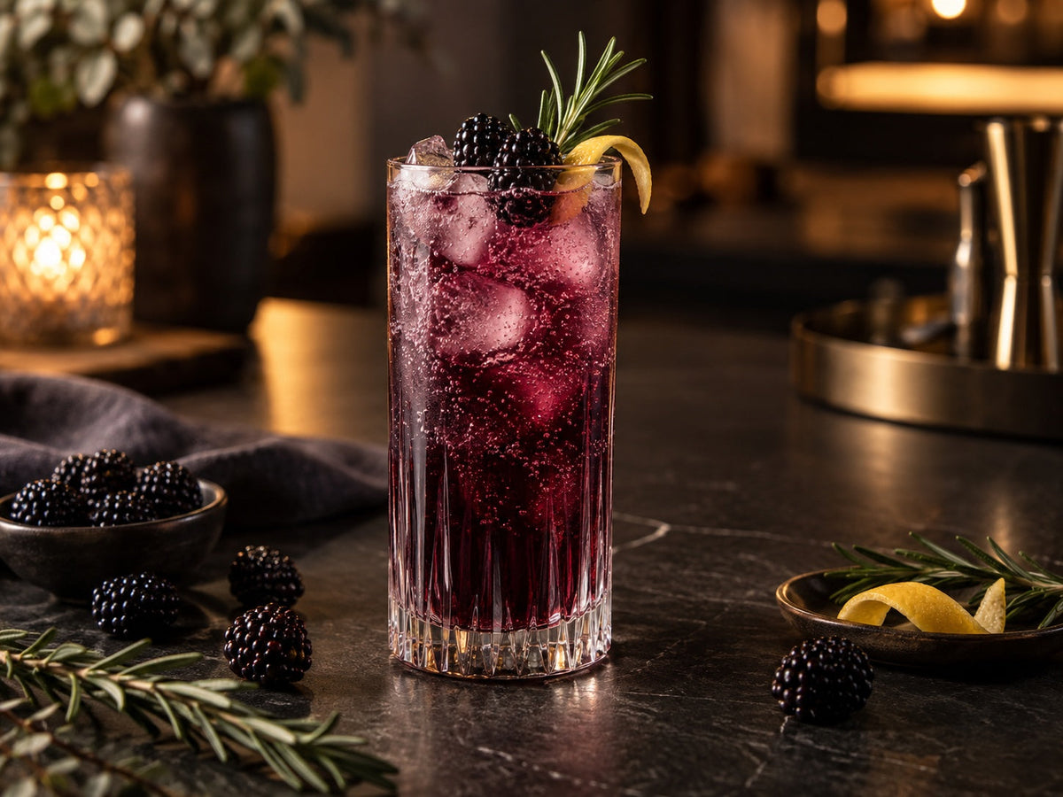 Blackberry & Rosemary Sparkler mocktail with fresh blackberries, rosemary, lemon and ice