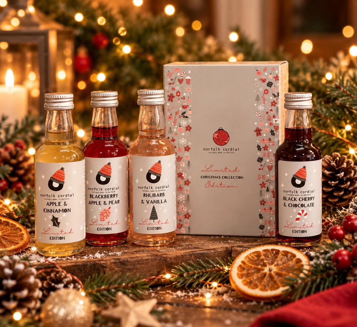 Norfolk Cordial 4 x 50ml Christmas gift set with four festive limited-edition cordials and gift box in a warm seasonal setting.