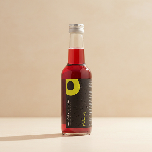 Norfolk Cordial Blackberry 250ml bottle on a warm neutral background