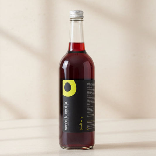 Norfolk Cordial Blackberry 750ml bottle on a warm neutral background