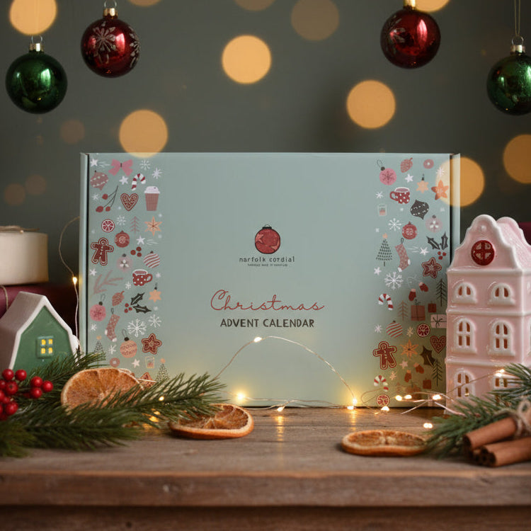 Norfolk Cordial 24-flavour Christmas advent calendar with individual mini cordial bottles, designed for corporate gifting.
