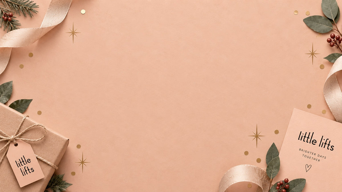 Little Lifts charity Christmas gifting backdrop with festive gift wrap and seasonal details, supporting Norfolk Cordial’s Christmas fundraising campaign.